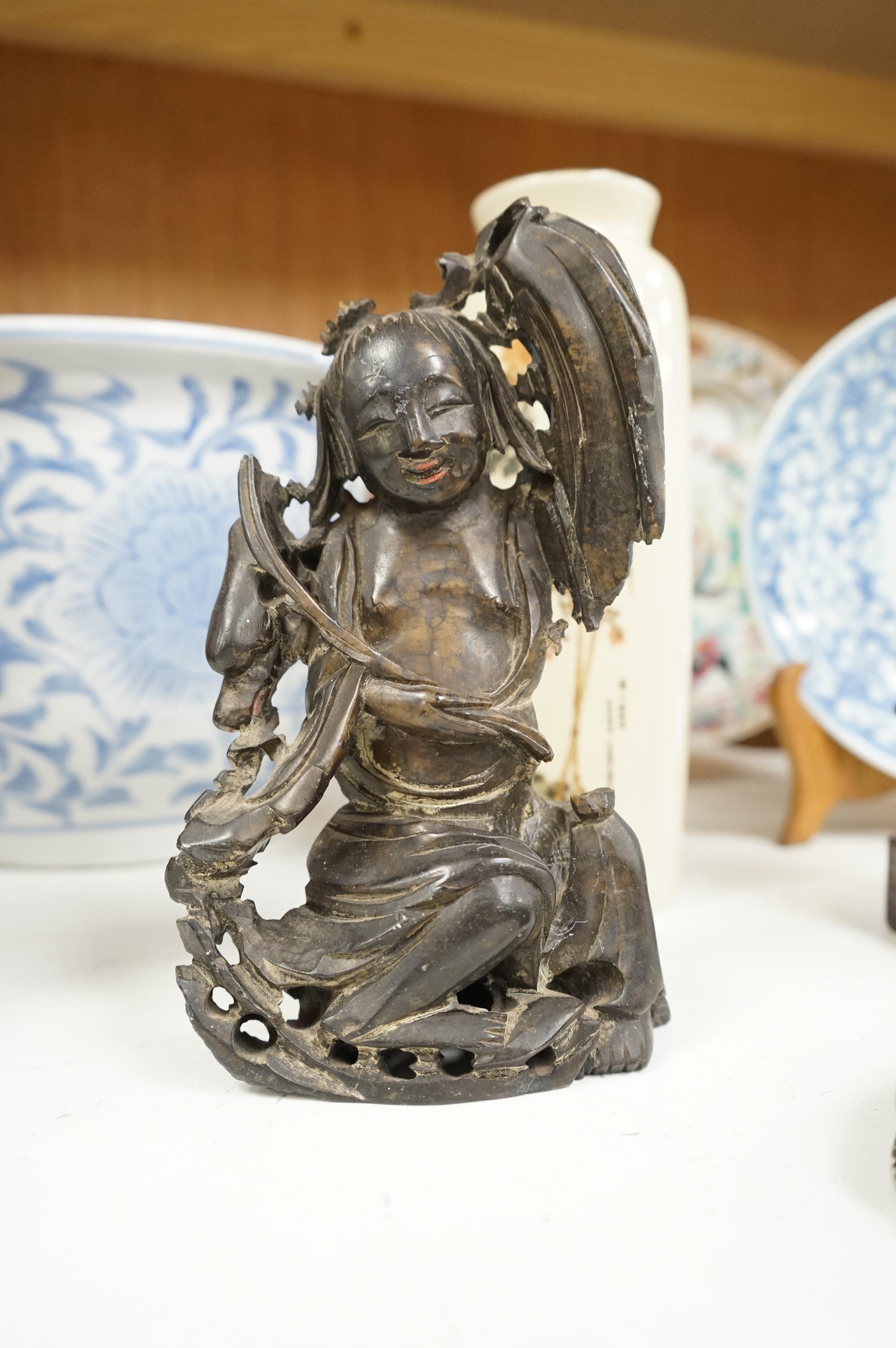 A large collection of various Chinese and Japanese ceramics and collectables to include a 19th century white glazed porcelain figure of Guanyin, largest 30.5cm